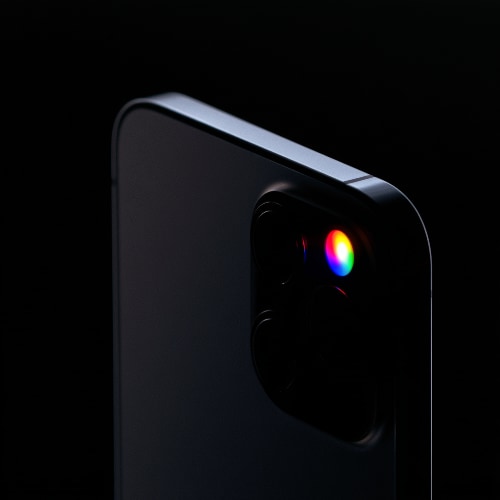 Close-up of a smartphone camera module with a brightly glowing multicolor LED, representing Google’s new Pixel HiLight feature.